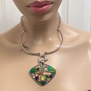 Silver tone enamel painted crystal rhinestone pendant silver tone necklace. Used